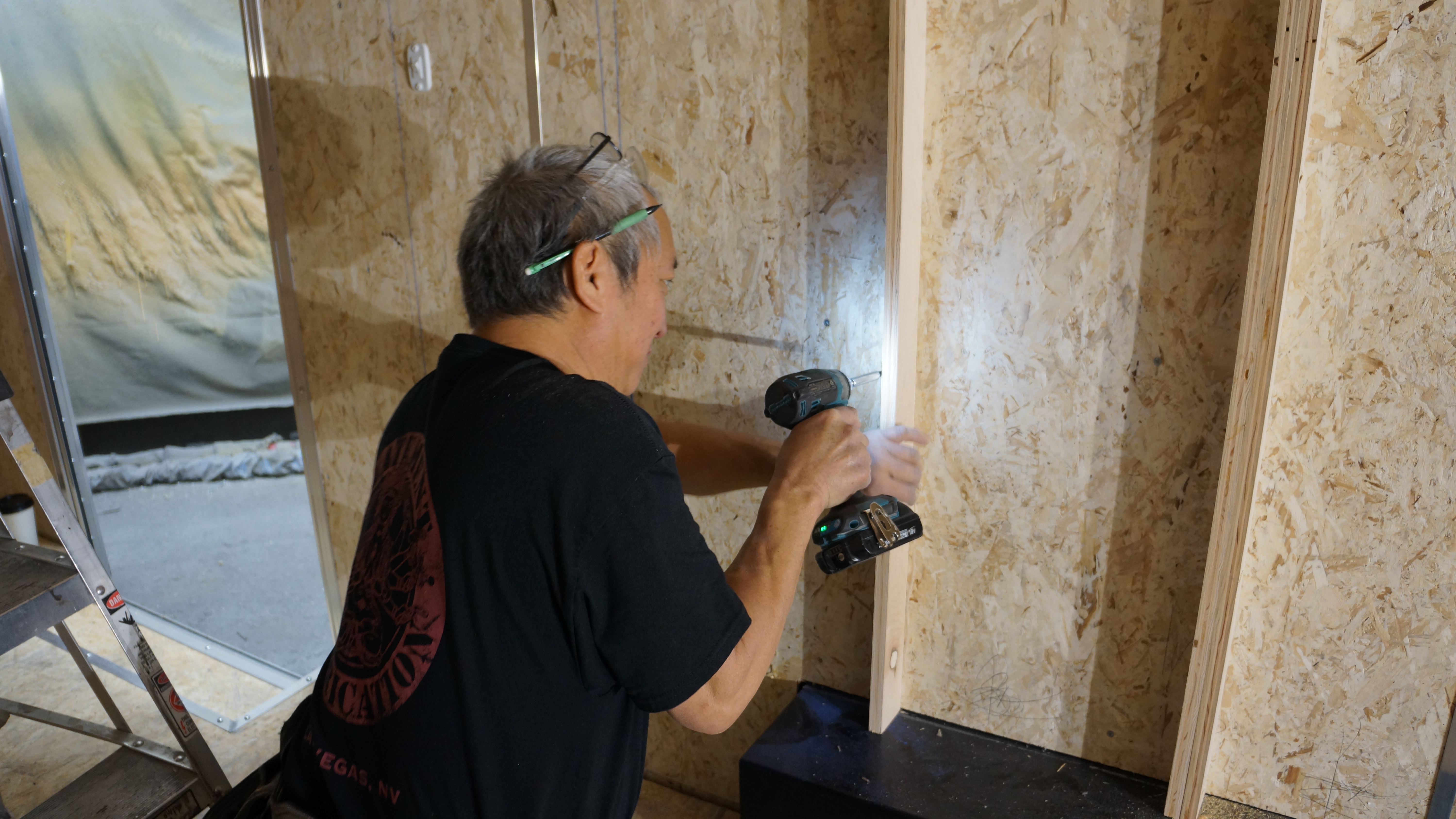 Statement Fabrication craftsman at work in woodworking workshop